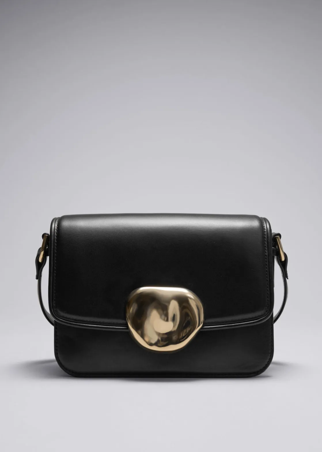 Sculptural Buckle Leather Bag